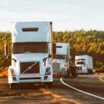 White Volvo Semi-truck on Side of Road